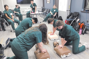 High school students get 'raw' experience of what it's like to be a clinician through Holy Name career program